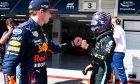 Max Verstappen (NLD) Red Bull Racing congratulates pole sitter Lewis Hamilton (GBR) Mercedes AMG F1 in qualifying parc ferme. 31.07.2021. Formula 1 World Championship, Rd 11, Hungarian Grand Prix, Budapest