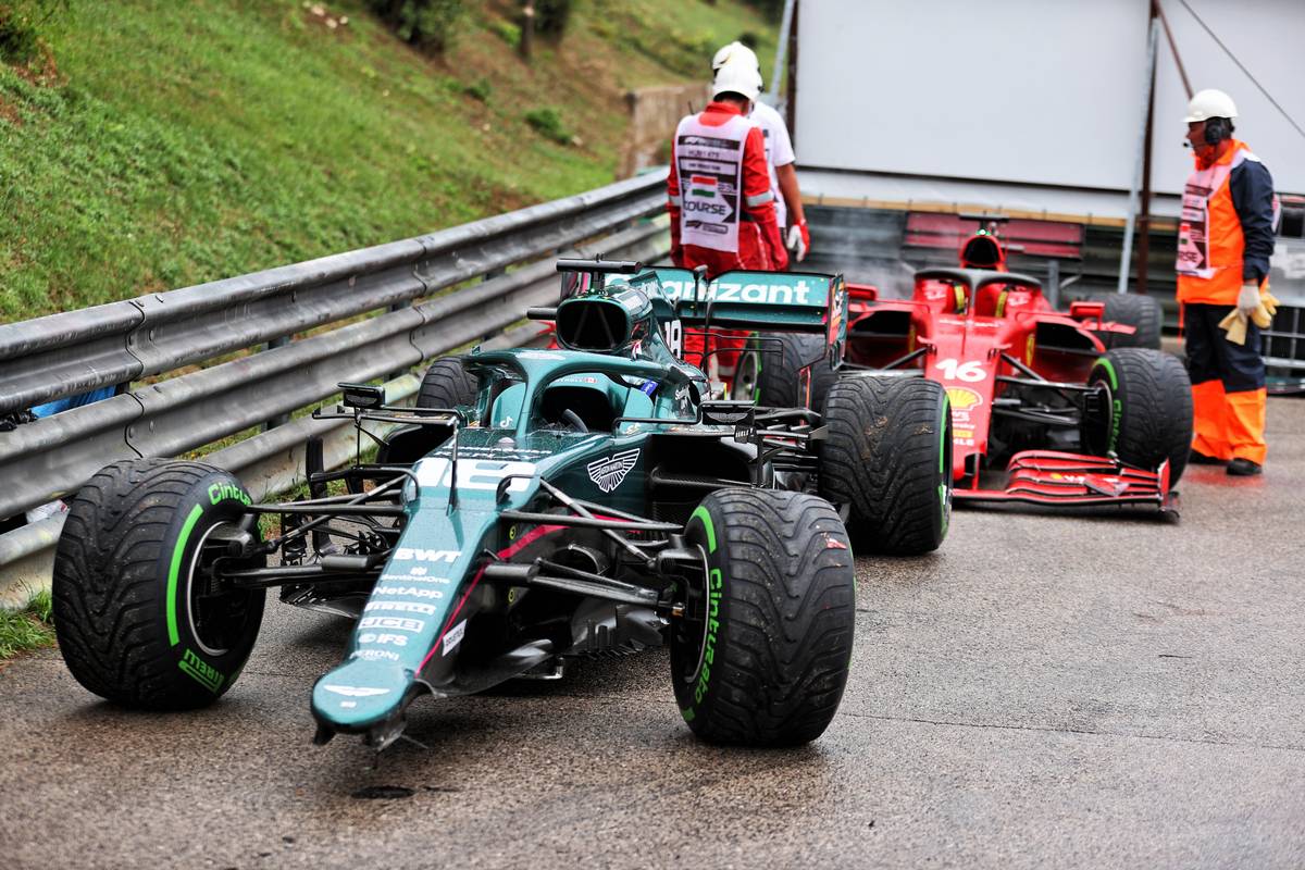 The damaged, retired cars of Lance Stroll (CDN) Aston Martin F1 Team AMR21 and Charles Leclerc (MON) Ferrari. 01.08.2021. Formula 1 World Championship, Rd 11, Hungarian Grand Prix, Budapest