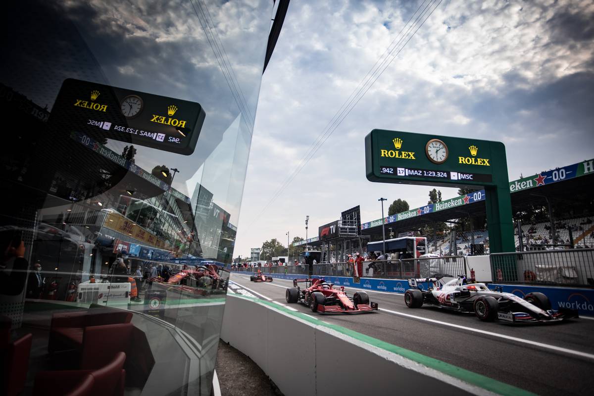 Charles Leclerc (MON) Ferrari SF-21 and Nikita Mazepin (RUS) Haas F1 Team VF-21 leave the pits. 10.09.2021. Formula 1 World Championship, Rd 14, Italian Grand Prix, Monza