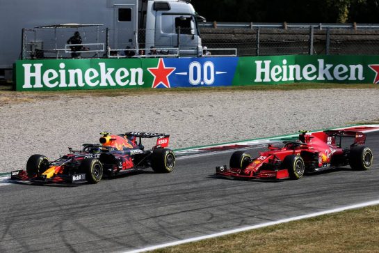 (L to R): Carlos Sainz Jr (ESP) Ferrari SF-21 and Sergio Perez (MEX) Red Bull Racing RB16B battle for position.
12.09.2021. Formula 1 World Championship, Rd 14, Italian Grand Prix, Monza, Italy, Race Day.
- www.xpbimages.com, EMail: requests@xpbimages.com © Copyright:  XPB Images