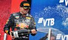 Max Verstappen (NLD) Red Bull Racing celebrates his second position on the podium. 26.09.2021. Formula 1 World Championship, Rd 15, Russian Grand Prix, Sochi