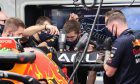 Mechanics work on Max Verstappen (NLD) Red Bull Racing RB16B rear wing before the start of qualifying. 23.10.2021. Formula 1 World Championship, Rd 17, United States Grand Prix, Austin