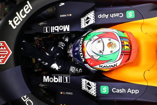 MEXICO CITY, MEXICO - NOVEMBER 05: Sergio Perez of Mexico and Red Bull Racing prepares to drive in the garage during practice ahead of the F1 Grand Prix of Mexico at Autodromo Hermanos Rodriguez on November 05, 2021 in Mexico City, Mexico. (Photo by Mark Thompson/Getty Images) // Getty Images / Red Bull Content Pool  // SI202111050724 // Usage for editorial use only //