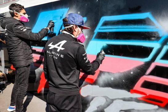Esteban Ocon (FRA) Alpine F1 Team and Fernando Alonso (ESP) Alpine F1 Team - Pantone spray painting.
07.11.2021. Formula 1 World Championship, Rd 18, Mexican Grand Prix, Mexico City, Mexico, Race Day.
- www.xpbimages.com, EMail: requests@xpbimages.com © Copyright: Charniaux / XPB Images
