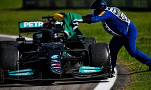 Hamilton escapes with fine for post-race seat belt breach