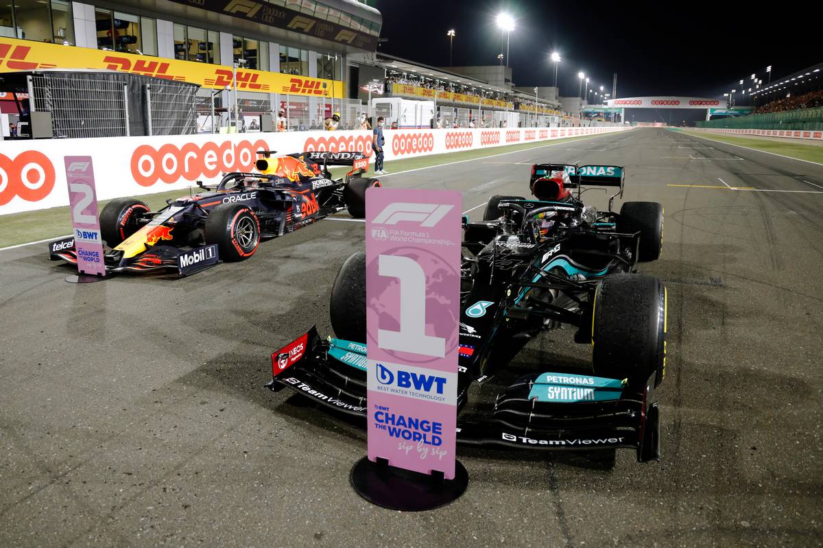 Race winner Lewis Hamilton (GBR) Mercedes AMG F1 W12 and second placed Max Verstappen (NLD) Red Bull Racing RB16B in parc ferme. 21.11.2021. Formula 1 World Championship, Rd 20, Qatar Grand Prix, Doha