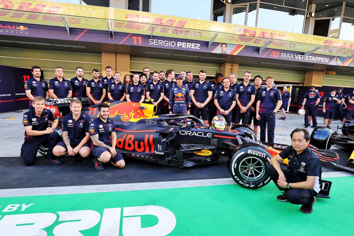 Sergio Perez (MEX) Red Bull Racing RB16B at a team photograph. 09.12.2021. Formula 1 World Championship, Rd 22, Abu Dhabi Grand Prix, Yas Marina