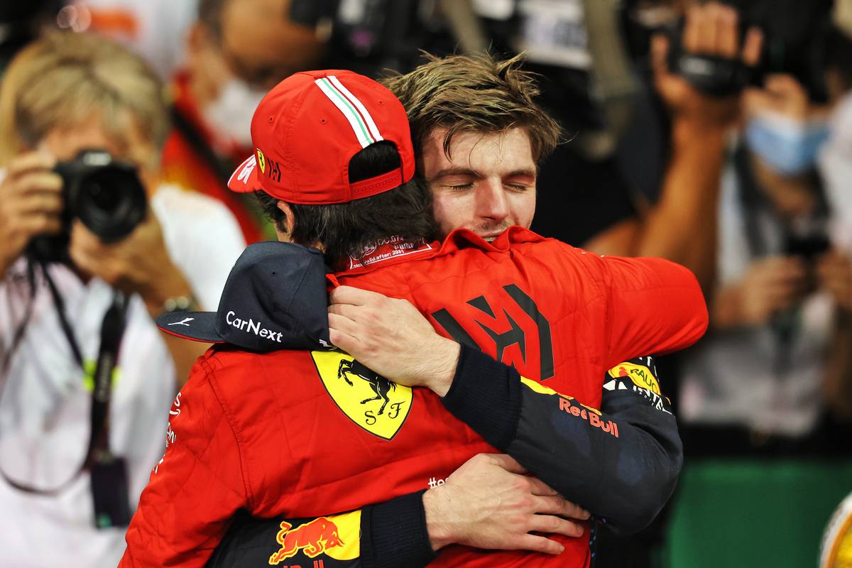 Third placed Carlos Sainz Jr (ESP) Ferrari celebrates with race winner and World Champion Max Verstappen (NLD) Red Bull Racing in qualifying parc ferme. 12.12.2021. Formula 1 World Championship, Rd 22, Abu Dhabi 