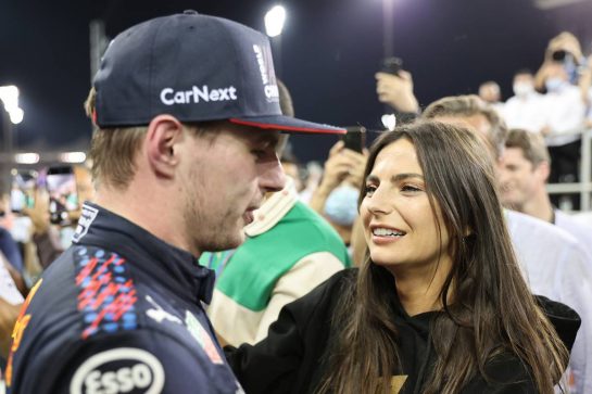 1st place and new World Champion, Max Verstappen (NLD) Red Bull Racing RB16B with Kelly Piquet (BRA) with her boyfriend Max Verstappen (NLD) Red Bull Racing.12.12.2021. Formula 1 World Championship, Rd 22, Abu Dhabi Grand Prix, Yas Marina Circuit, Abu Dhabi, Race Day.- www.xpbimages.com, EMail: requests@xpbimages.com © Copyright: Batchelor / XPB Images