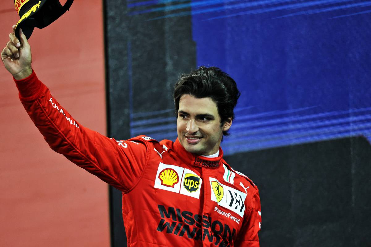 Carlos Sainz Jr (ESP) Ferrari celebrates his third position on the podium. 12.12.2021. Formula 1 World Championship, Rd 22, Abu Dhabi Grand Prix, Yas Marina