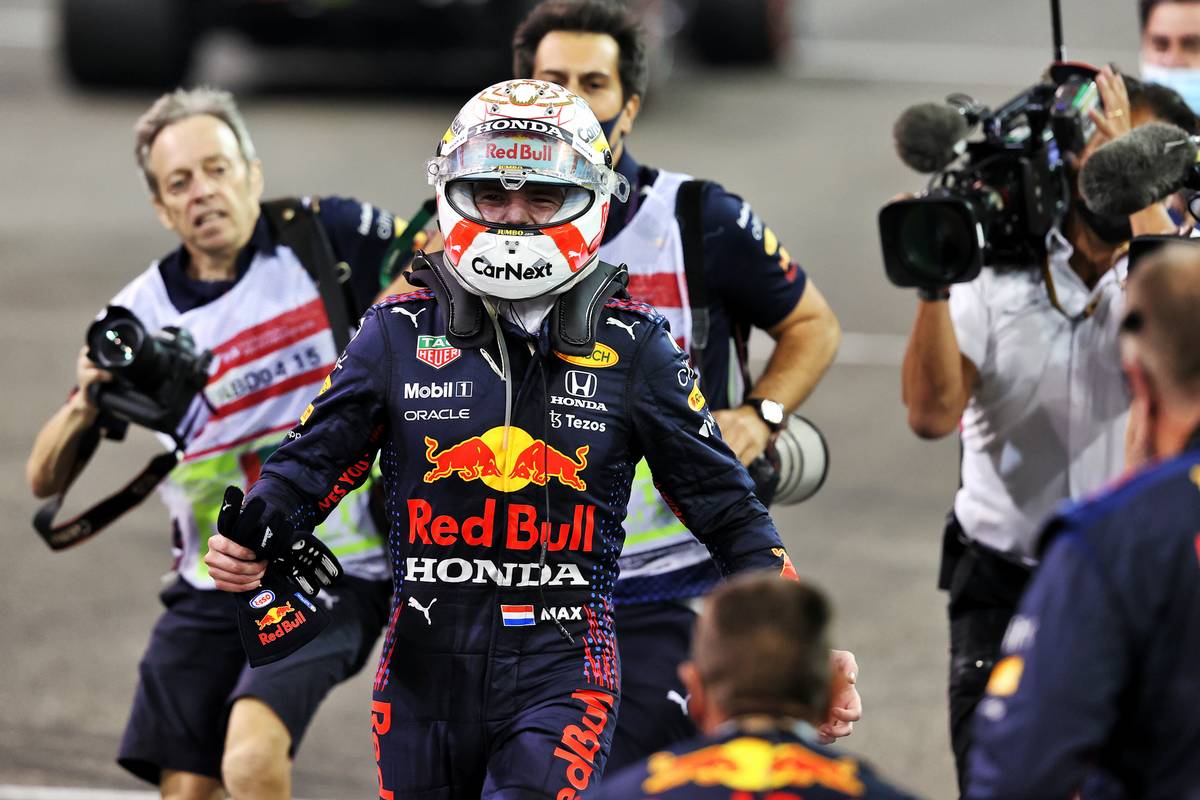 Race winner and World Champion Max Verstappen (NLD) Red Bull Racing celebrates in parc ferme. 12.12.2021. Formula 1 World Championship, Rd 22, Abu Dhabi Grand Prix, Yas Marina