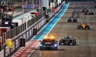 Lewis Hamilton (GBR) Mercedes AMG F1 W12 leads behind the Aston Martin FIA Safety Car. 12.12.2021. Formula 1 World Championship, Rd 22, Abu Dhabi Grand Prix, Yas Marina