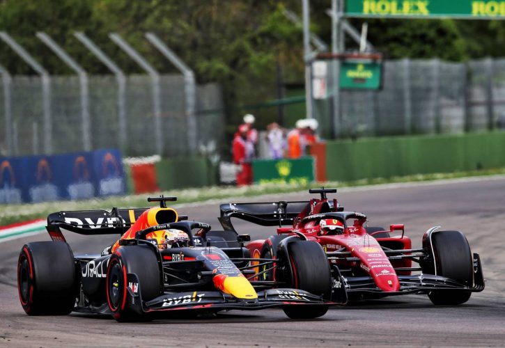 Max Verstappen (NLD) Red Bull Racing RB18 passes Charles Leclerc (MON) Ferrari F1-75 for the lead. 23.04.2022. Formula 1 World Championship, Rd 4, Emilia Romagna Grand Prix, Imola, Italy, Sprint