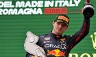 Race winner Max Verstappen (NLD) Red Bull Racing celebrates on the podium. 24.04.2022. Formula 1 World Championship, Rd 4, Emilia Romagna Grand Prix, Imola, Italy, Race