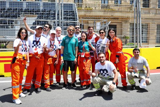 Sebastian Vettel (GER) Aston Martin F1 Team with marshals on the circuit.
09.06.2022. Formula 1 World Championship, Rd 8, Azerbaijan Grand Prix, Baku Street Circuit, Azerbaijan, Preparation Day.
- www.xpbimages.com, EMail: requests@xpbimages.com © Copyright: Bearne / XPB Images
