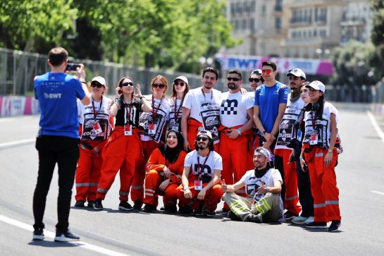 Esteban Ocon (FRA) Alpine F1 Team with marshals on the circuit.
09.06.2022. Formula 1 World Championship, Rd 8, Azerbaijan Grand Prix, Baku Street Circuit, Azerbaijan, Preparation Day.
- www.xpbimages.com, EMail: requests@xpbimages.com © Copyright: Charniaux / XPB Images