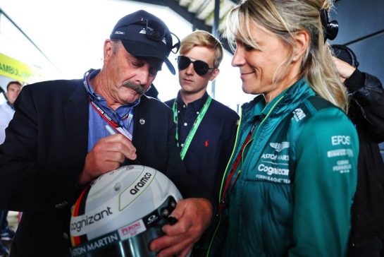 (L to R): Nigel Mansell (GBR) with Britta Roeske (AUT) Aston Martin F1 Team Public Relations Manager, signing the helmet of Sebastian Vettel (GER) Aston Martin F1 Team.
03.07.2022. Formula 1 World Championship, Rd 10, British Grand Prix, Silverstone, England, Race Day.
- www.xpbimages.com, EMail: requests@xpbimages.com © Copyright: Batchelor / XPB Images