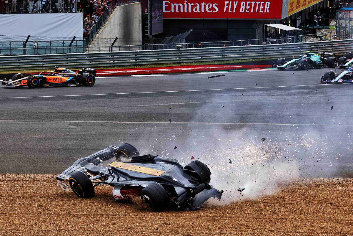 Guanyu Zhou (CHN) Alfa Romeo F1 Team C42 crashes at the start of the race. 03.07.2022. Formula 1 World Championship, Rd 10, British Grand Prix, Silverstone, England, Race