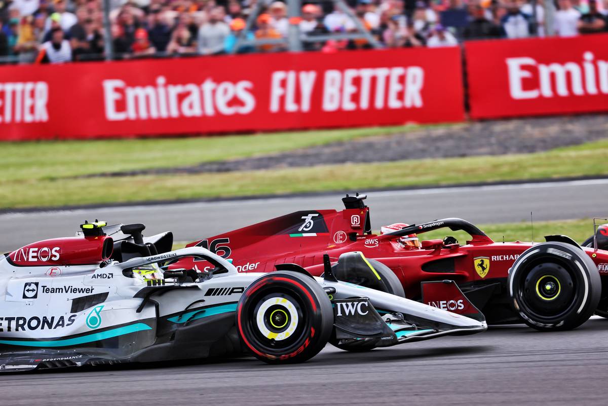 Lewis Hamilton (GBR) Mercedes AMG F1 W13 and Charles Leclerc (MON) Ferrari F1-75 battle for position. 03.07.2022. Formula 1 World Championship, Rd 10, British Grand Prix, Silverstone, England, Race
