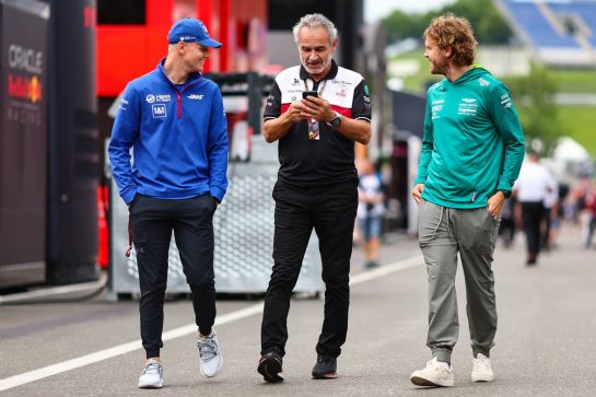 Mick Schumacher (GER), Haas F1 Team and Sebastian Vettel (GER), Aston Martin F1 Team 
07.07.2022. Formula 1 World Championship, Rd 11, Austrian Grand Prix, Spielberg, Austria, Preparation Day.
- www.xpbimages.com, EMail: requests@xpbimages.com © Copyright: Charniaux / XPB Images