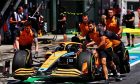 The McLaren MCL36 of Lando Norris (GBR) McLaren is recovered back to the pits by mechanics. 08.07.2022. Formula 1 World Championship, Rd 11, Austrian Grand Prix, Spielberg, Austria, Qualifying
