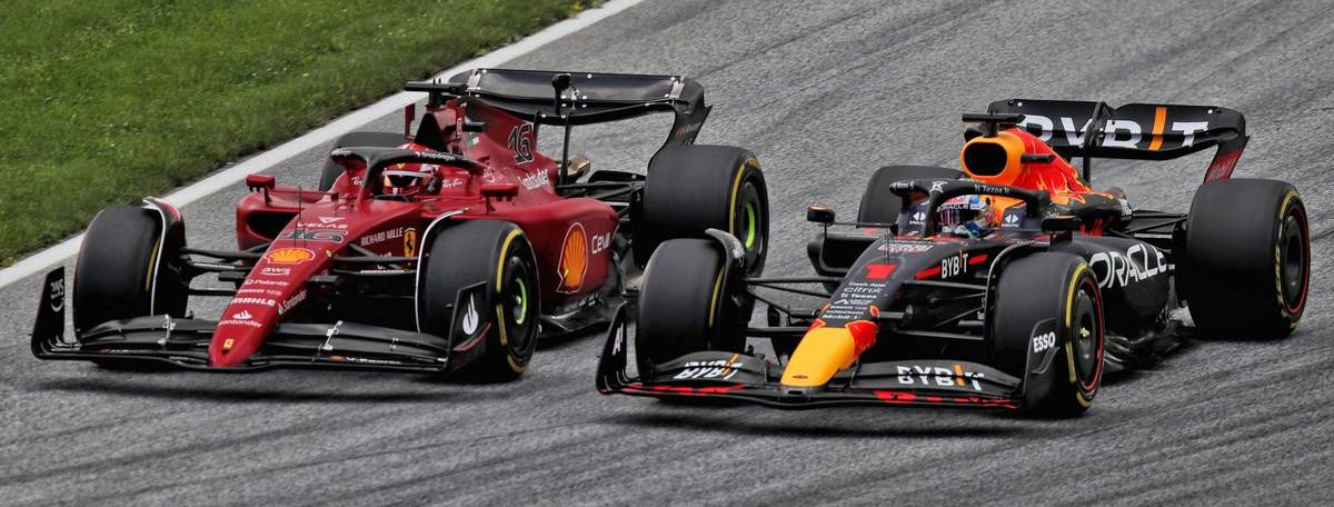 Max Verstappen (NLD) Red Bull Racing RB18 and Charles Leclerc (MON) Ferrari F1-75 battle for position. 10.07.2022. Formula 1 World Championship, Rd 11, Austrian Grand Prix, Spielberg, Austria, Race