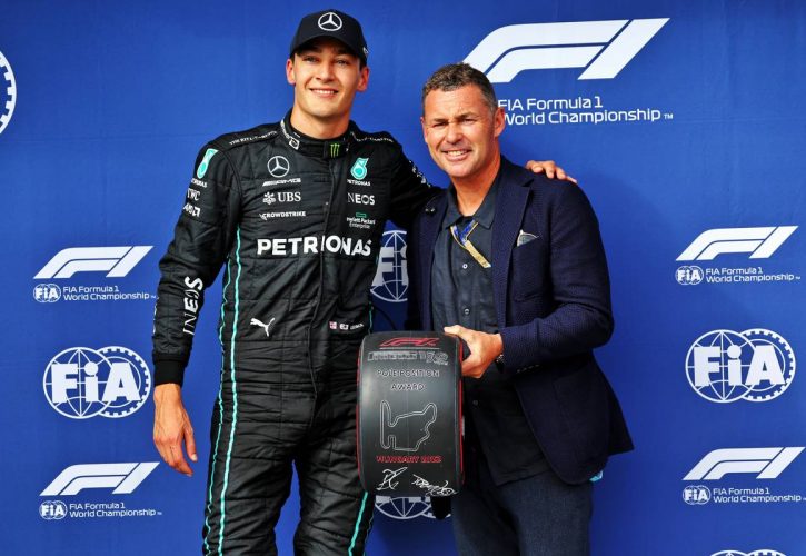 Pole sitter George Russell (GBR) Mercedes AMG F1 celebrates in qualifying parc ferme with Tom Kristensen (DEN). 30.07.2022. Formula 1 World Championship, Rd 13, Hungarian Grand Prix, Budapest, Hungary, Qualifying