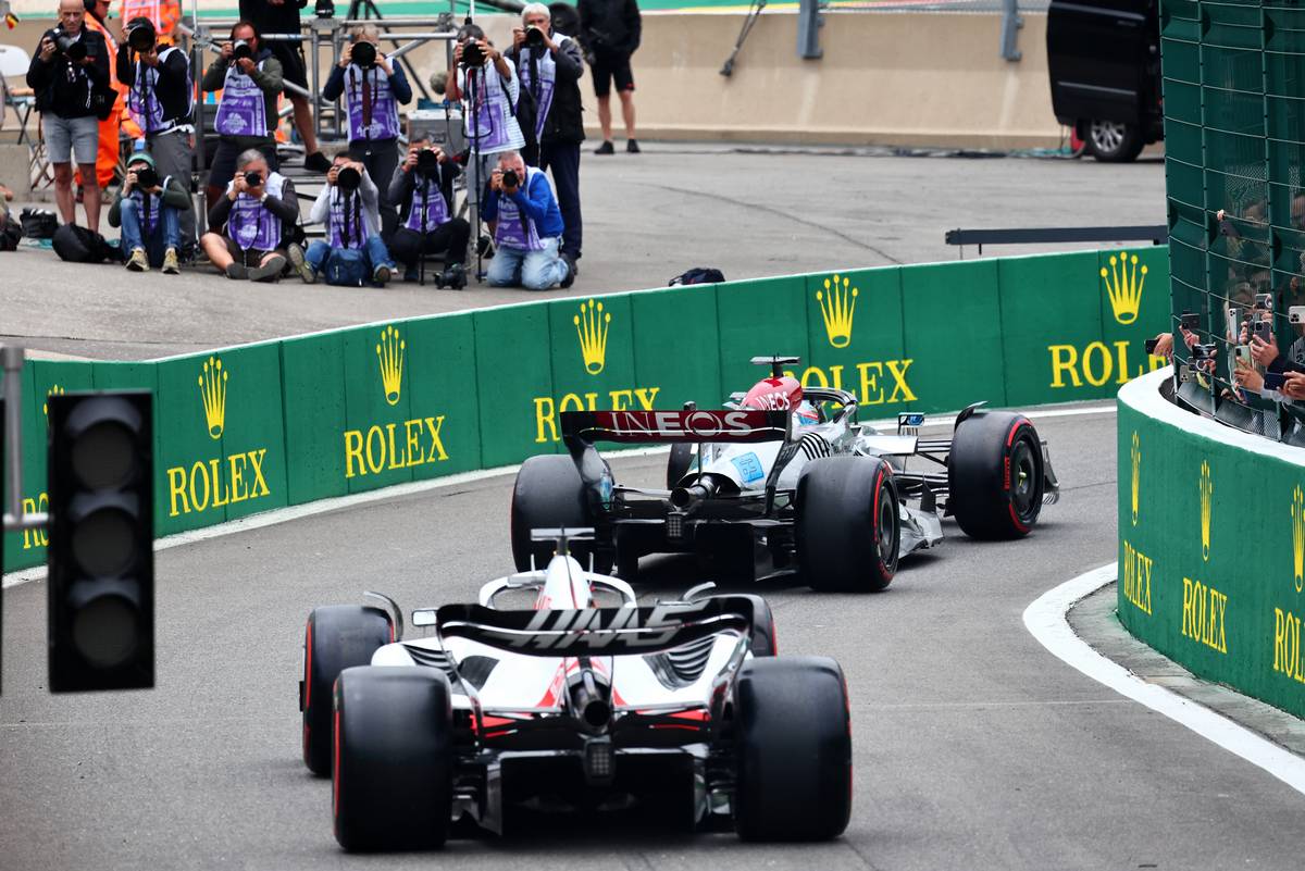 George Russell (GBR) Mercedes AMG F1 W13 and Kevin Magnussen (DEN) Haas VF-22 leave the pits. 27.08.2022. Formula 1 World Championship, Rd 14, Belgian Grand Prix, Spa Francorchamps, Belgium, Qualifying