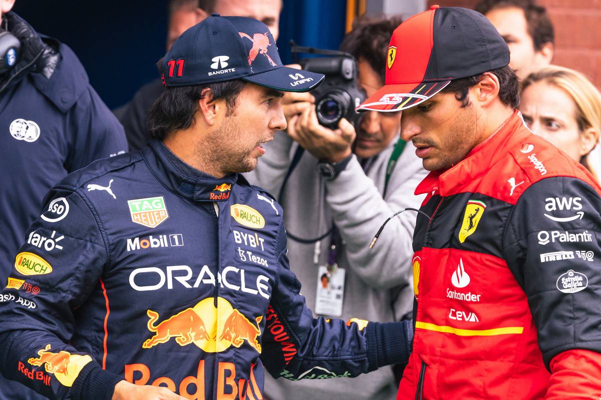 Sergio Perez (MEX) Red Bull Racing with Carlos Sainz Jr (ESP) Ferrari in qualifying parc ferme. 27.08.2022. Formula 1 World Championship, Rd 14, Belgian Grand Prix, Spa Francorchamps, Belgium, Qualifying