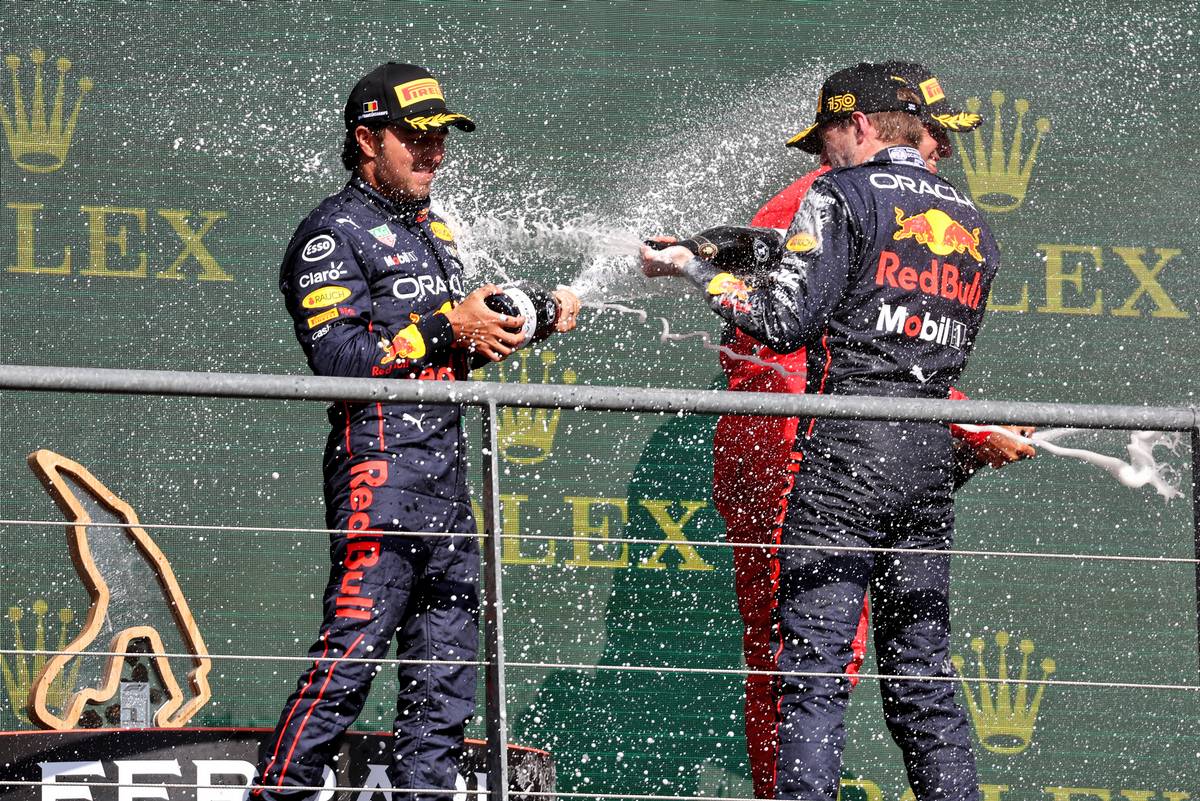 Sergio Perez (MEX) Red Bull Racing celebrates with race winner and team mate Max Verstappen (NLD) Red Bull Racing on the podium. 28.08.2022. Formula 1 World Championship, Rd 14, Belgian Grand Prix, Spa Francorchamps, Belgium, Race