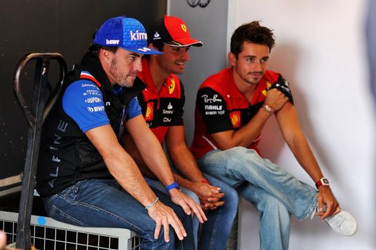 (L to R): Fernando Alonso (ESP) Alpine F1 Team with Carlos Sainz Jr (ESP) Ferrari and Charles Leclerc (MON) Ferrari on the drivers parade.
04.09.2022. Formula 1 World Championship, Rd 14, Dutch Grand Prix, Zandvoort, Netherlands, Race Day.
- www.xpbimages.com, EMail: requests@xpbimages.com © Copyright: Bearne / XPB Images