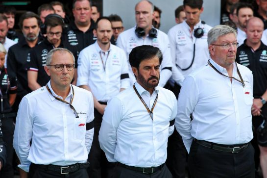 (L to R): Stefano Domenicali (ITA) Formula One President and CEO; Mohammed Bin Sulayem (UAE) FIA President; and Ross Brawn (GBR) Managing Director, Motor Sports, in the pits as a minutes's silence is held in memory of Queen Elizabeth II.
09.09.2022. Formula 1 World Championship, Rd 16, Italian Grand Prix, Monza, Italy, Practice Day.
 - www.xpbimages.com, EMail: requests@xpbimages.com © Copyright: Coates / XPB Images