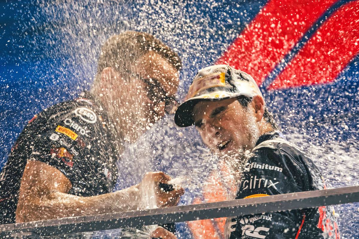 Race winner Sergio Perez (MEX) Red Bull Racing celebrates on the podium. 02.10.2022. Formula 1 World Championship, Rd 17, Singapore Grand Prix, Marina Bay Street Circuit, Singapore, Race