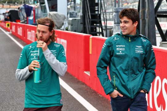 (L to R): Sebastian Vettel (GER) Aston Martin F1 Team with team mate Lance Stroll (CDN) Aston Martin F1 Team.
06.10.2022. Formula 1 World Championship, Rd 18, Japanese Grand Prix, Suzuka, Japan, Preparation Day.
- www.xpbimages.com, EMail: requests@xpbimages.com © Copyright: Coates / XPB Images