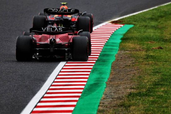 Sergio Perez (MEX) Red Bull Racing RB18 leads Charles Leclerc (MON) Ferrari F1-75.
08.10.2022. Formula 1 World Championship, Rd 18, Japanese Grand Prix, Suzuka, Japan, Qualifying Day.
- www.xpbimages.com, EMail: requests@xpbimages.com © Copyright: Coates / XPB Images