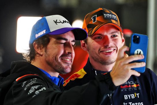 (L to R): Fernando Alonso (ESP) Alpine F1 Team with World Champion Max Verstappen (NLD) Red Bull Racing.
09.10.2022. Formula 1 World Championship, Rd 18, Japanese Grand Prix, Suzuka, Japan, Race Day.
- www.xpbimages.com, EMail: requests@xpbimages.com © Copyright: Batchelor / XPB Images