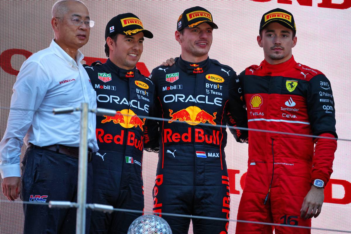 The podium (L to R): Charles Leclerc (MON) Ferrari, second; Sergio Perez (MEX) Red Bull Racing, race winner; Carlos Sainz Jr (ESP) Ferrari, third. 09.10.2022. Formula 1 World Championship, Rd 18, Japanese Grand Prix, Suzuka, Japan, Race