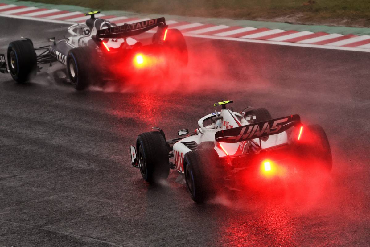 Yuki Tsunoda (JPN) AlphaTauri AT03 leads Mick Schumacher (GER) Haas VF-22. 09.10.2022. Formula 1 World Championship, Rd 18, Japanese Grand Prix, Suzuka, Japan, Race