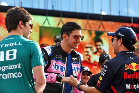 (L to R): Lance Stroll (CDN) Aston Martin F1 Team; Esteban Ocon (FRA) Alpine F1 Team; and Sergio Perez (MEX) Red Bull Racing, on the drivers parade.
20.11.2022. Formula 1 World Championship, Rd 22, Abu Dhabi Grand Prix, Yas Marina Circuit, Abu Dhabi, Race Day.
 - www.xpbimages.com, EMail: requests@xpbimages.com © Copyright: Coates / XPB Images
