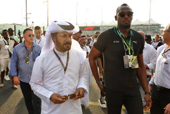 (L to R): Mohammed Bin Sulayem (UAE) FIA President with Usain Bolt (JAM) Former Athlete on the grid.
20.11.2022. Formula 1 World Championship, Rd 22, Abu Dhabi Grand Prix, Yas Marina Circuit, Abu Dhabi, Race Day.
 - www.xpbimages.com, EMail: requests@xpbimages.com © Copyright: Coates / XPB Images