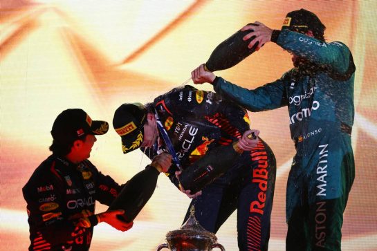 The podium (L to R): Sergio Perez (MEX) Red Bull Racing, second; Max Verstappen (NLD) Red Bull Racing, race winner; Fernando Alonso (ESP) Aston Martin F1 Team, third.
05.03.2023. Formula 1 World Championship, Rd 1, Bahrain Grand Prix, Sakhir, Bahrain, Race Day.
 - www.xpbimages.com, EMail: requests@xpbimages.com © Copyright: Coates / XPB Images
