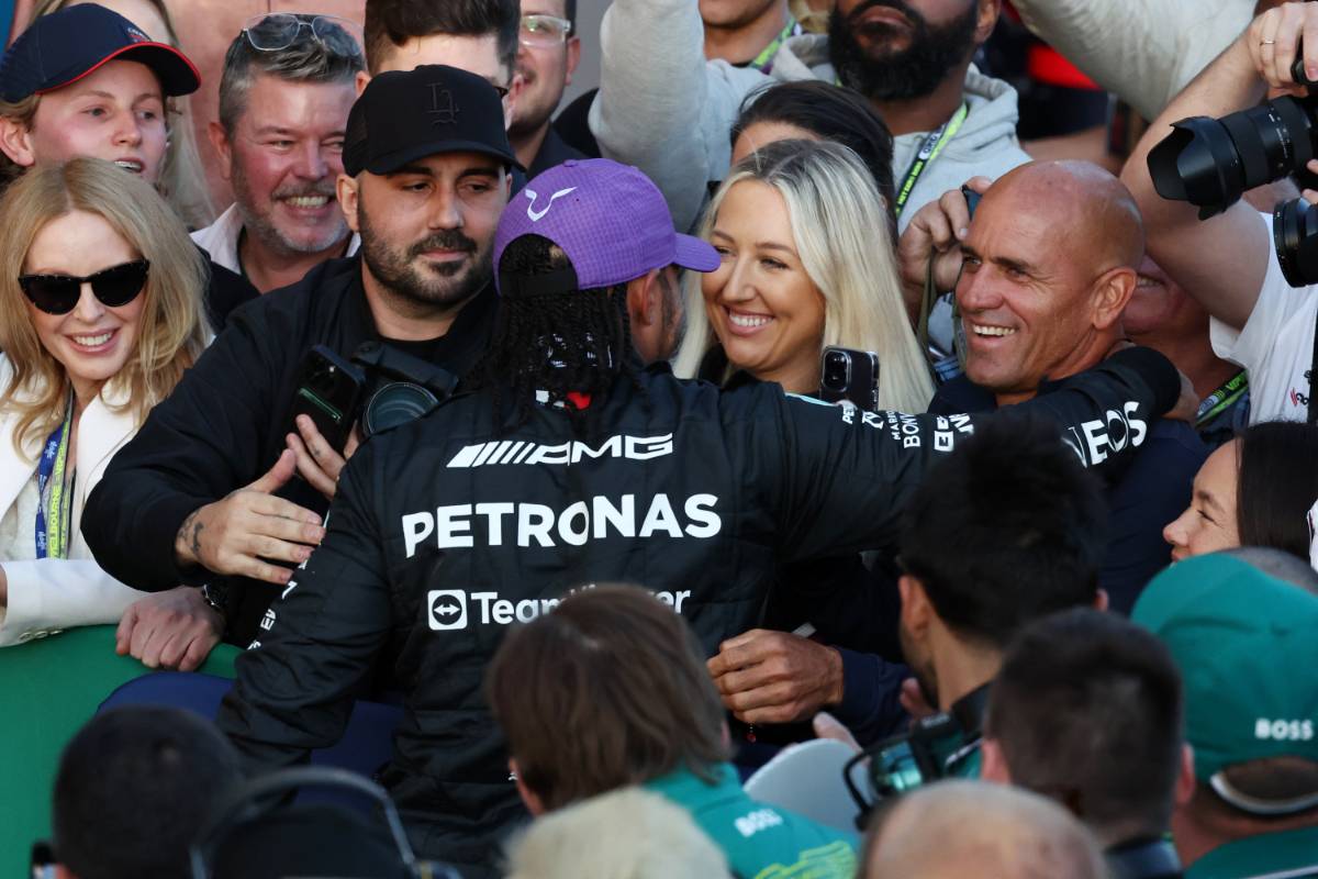 Lewis Hamilton (GBR) Mercedes AMG F1 celebrates his second position in parc ferme with Kylie Minogue (AUS) Singer and Kelly Slater (USA) Surfer.

02.04.2023. Formula 1 World Championship, Rd 3, Australian Grand Prix, Albert Park, Melbourne, Australia, Race Day.
- www.xpbimages.com, EMail: requests@xpbimages.com © Copyright: Moy / XPB Images