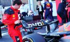 Charles Leclerc (MON) Ferrari SF-23 looks at the Red Bull Racing RB19 of Sergio Perez (MEX) Red Bull Racing in parc ferme. 29.04.2023. Formula 1 World Championship, Rd 4, Azerbaijan Grand Prix, Baku Street Circuit, Azerbaijan, Sprint Day. - www.xpbimages.com, EMail: requests@xpbimages.com © Copyright: Batchelor / XPB Images