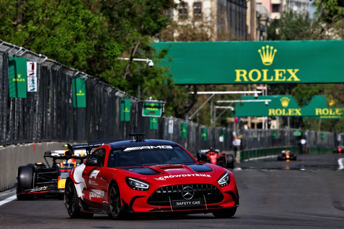 Sergio Perez (MEX) Red Bull Racing RB19 leads behind the Mercedes FIA Safety Car. 30.04.2023. Formula 1 World Championship, Rd 4, Azerbaijan Grand Prix, Baku Street Circuit, Azerbaijan, Race Day. - www.xpbimages.com, EMail: requests@xpbimages.com © Copyright: Charniaux / XPB Images