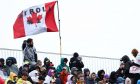 Circuit atmosphere - fans in the grandstand and a banner for Zhou Guanyu (CHN) Alfa Romeo F1 Team. 17.06.2023. Formula 1 World Championship, Rd 9, Canadian Grand Prix, Montreal, Canada, Qualifying Day. - www.xpbimages.com, EMail: requests@xpbimages.com © Copyright: Batchelor / XPB Images