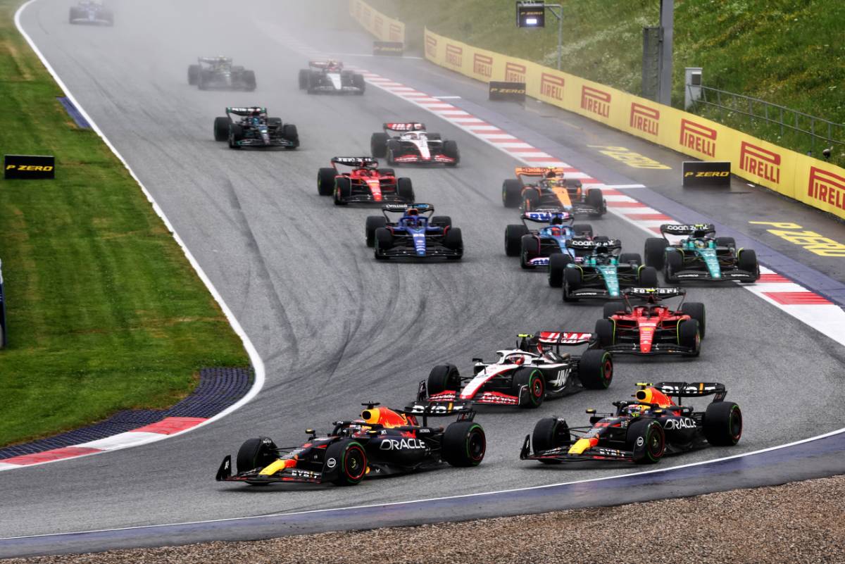 (L to R): Max Verstappen (NLD) Red Bull Racing RB19 and team mate Sergio Perez (MEX) Red Bull Racing RB19 battle for the lead at the start of the race. 01.07.2023. Formula 1 World Championship, Rd 10, Austrian Grand Prix, Spielberg, Austria, Sprint Day. - www.xpbimages.com, EMail: requests@xpbimages.com © Copyright: Batchelor / XPB Images
