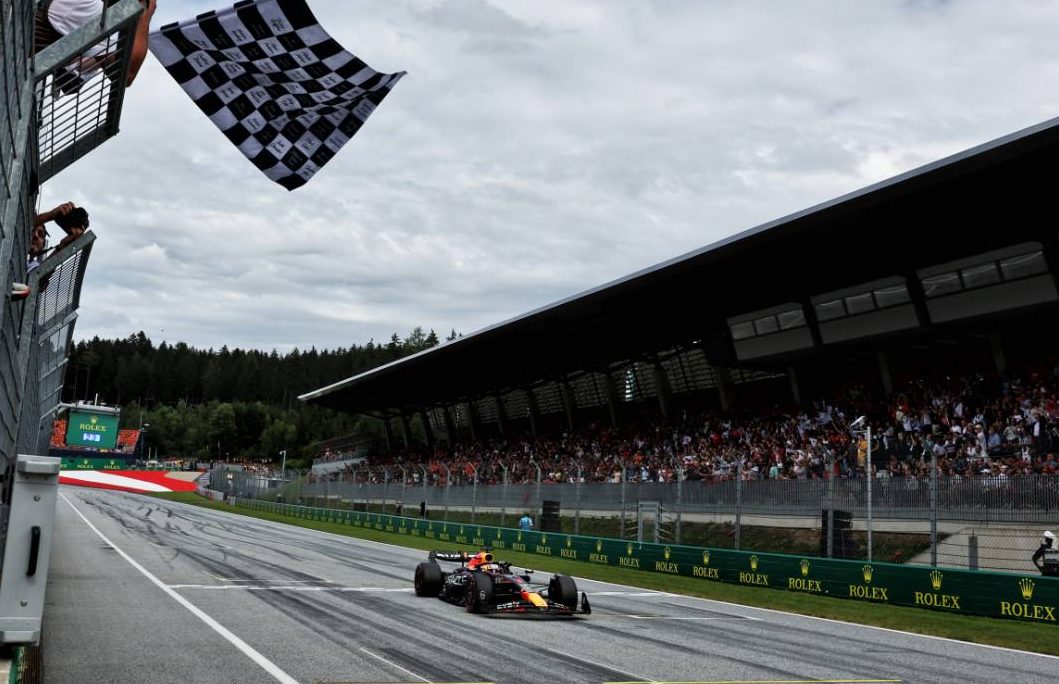 Race winner Max Verstappen (NLD) Red Bull Racing RB19 takes the chequered flag at the end of the race. 02.07.2023. Formula 1 World Championship, Rd 10, Austrian Grand Prix, Spielberg, Austria, Race Day. - www.xpbimages.com, EMail: requests@xpbimages.com © Copyright: Moy / XPB Images