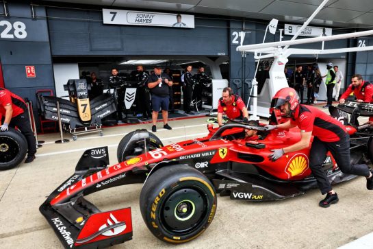 Ferrari SF-23 pushed past the fictional APXGP pit garages, in place for the forthcoming Apple movie.
06.07.2023. Formula 1 World Championship, Rd 11, British Grand Prix, Silverstone, England, Preparation Day.
- www.xpbimages.com, EMail: requests@xpbimages.com © Copyright: Batchelor / XPB Images