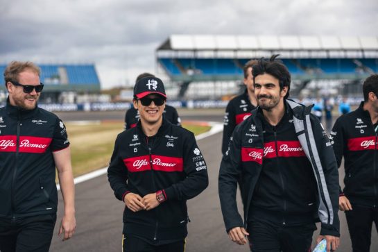 Zhou Guanyu (CHN) Alfa Romeo F1 Team walks the circuit with the team.
06.07.2023. Formula 1 World Championship, Rd 11, British Grand Prix, Silverstone, England, Preparation Day.
- www.xpbimages.com, EMail: requests@xpbimages.com © Copyright: Bearne / XPB Images