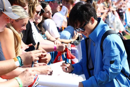 Yuki Tsunoda (JPN) AlphaTauri with fans.
07.07.2023. Formula 1 World Championship, Rd 11, British Grand Prix, Silverstone, England, Practice Day.
 - www.xpbimages.com, EMail: requests@xpbimages.com © Copyright: Coates / XPB Images